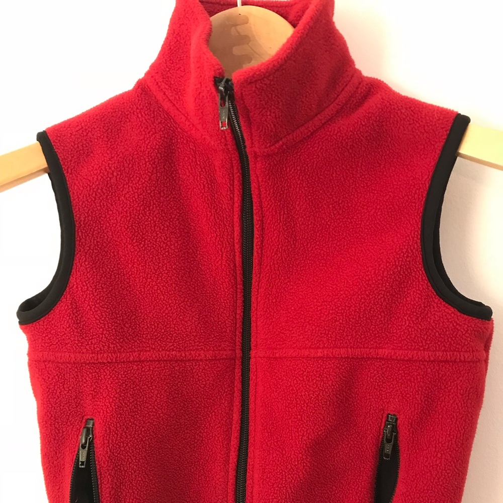 Kids cozy red fleece vest with black piping